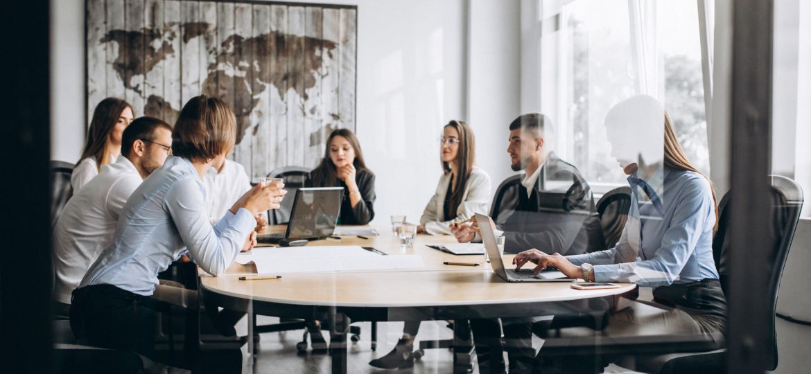 group-people-working-out-business-plan-office